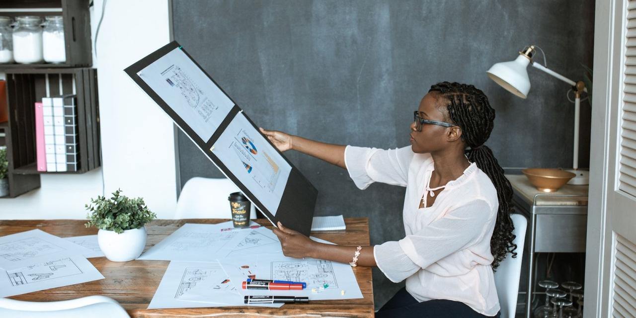 Woman looking at a large-sized project