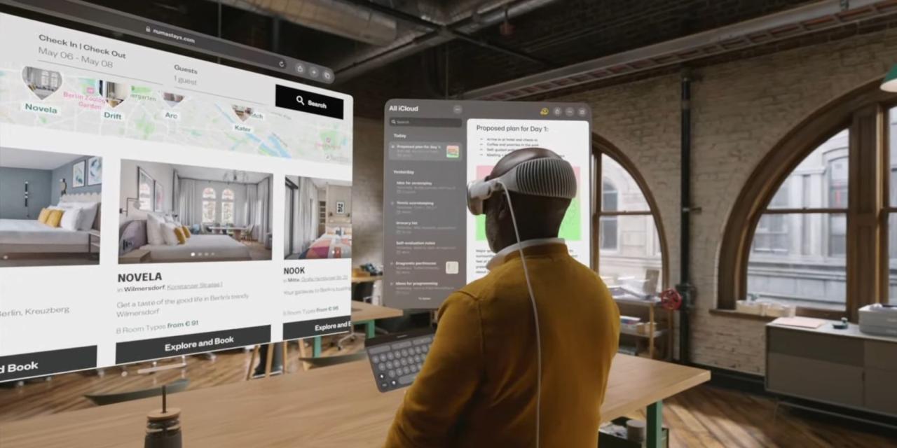 Man wearing Apple Vision Pro headset working in augmented reality